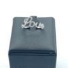 Anello oro bianco e diamanti con scritta love