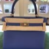 Hermès Kelly 25 retourne veau  pellame togo NUOVA 2025 Aprile seriale K color blue con hardware hardware Permabrass color oro caldo