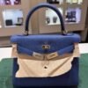 Hermès Kelly 25 retourne veau  pellame togo NUOVA 2025 Aprile seriale K color blue con hardware hardware Permabrass color oro caldo