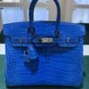 WhatsApp Image 2025-07-31 at 17.39.50 Hermès Birkin 25 crocodile poro porosus lisse stampa U second hand colore blue hardware palladio full set con scontrino ufficiale Hermès