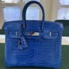 WhatsApp Image 2025-07-31 at 17.39.51 (1) Hermès Birkin 25 crocodile poro porosus lisse stampa U second hand colore blue hardware palladio full set con scontrino ufficiale Hermès