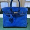 WhatsApp Image 2025-07-31 at 17.39.51 Hermès Birkin 25 crocodile poro porosus lisse stampa U second hand colore blue hardware palladio full set con scontrino ufficiale Hermès
