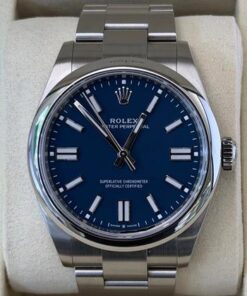 Rolex Oyster Perpetual Stainless med blue Dial NUOVO (2025) full set con documenti e scatola