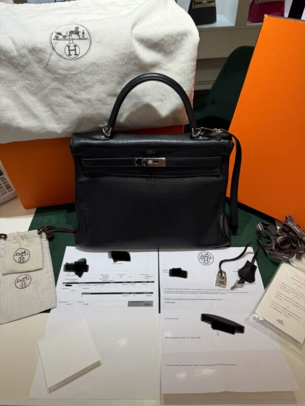 Hermès Kelly 35 retourne sacs Et voyage del 2013 second hand color noir full set top condition rigenerata spa Hermes nel Marzo 2024.