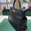 Hermès Kelly 35 retourne sacs Et voyage del 2013 second hand color noir full set top condition rigenerata spa Hermes nel Marzo 2024.