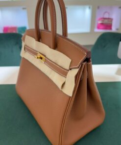 Alternative view of Hermès Birkin 25 retourne veau togo color gold ( marrone ) stampa K NUOVA 2025 Novembre hardware dorato full set con scontrino ufficiale Hermès pellicole stickers ovunque .