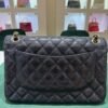 WhatsApp Image 2026-01-08 at 18.24.37 Chanel Classic flap (11:12) Chanel classica grande jumbo caviar doppia patta pelle vitello martellato & effetto dorato nero interno bordeaux