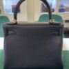 Hermès Kelly 28 Retourne pellame Taurillon Clémence NUOVA 2026 seriale K colore NERO noir ( nero ) con hardware dorato con tutti gli adesivi di protezione dell’imballaggio e dell’hardware full set full pellicole full stickers
