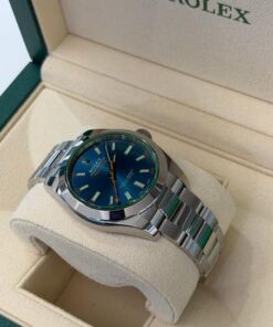 Alternative view of Rolex Milgauss NUOVO 2021 Italia vetro verde quadrante blu azzurro full set con documenti