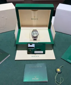 Alternative view of Rolex Datejust 36 NUOVO quadrante palme dial palma verde full set con documenti e scatola