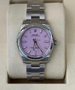 Rolex Oyster Perpetual 31 Pink rosa fucsia NUOVO 2026 full set con documenti e scatola