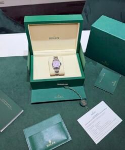 Alternative view of Rolex Oyster Perpetual 31 Pink rosa fucsia NUOVO 2026 full set con documenti e scatola