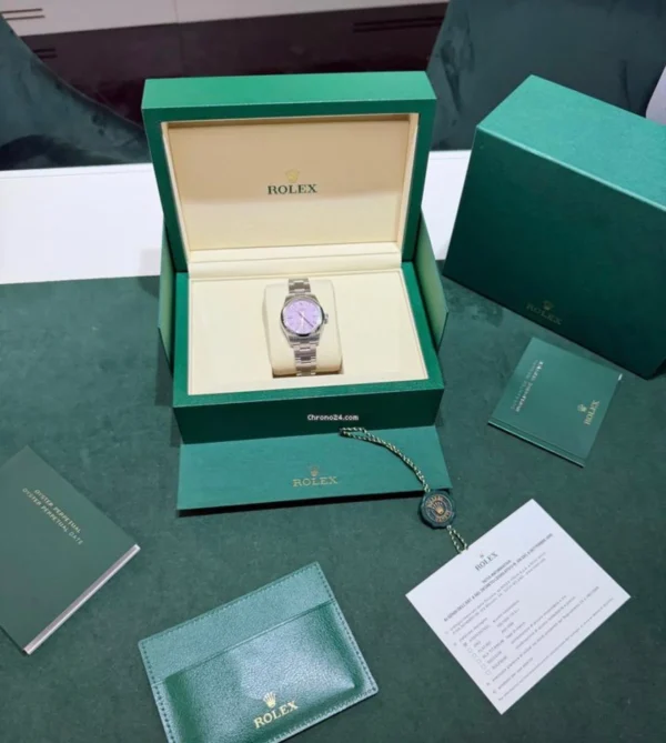 Rolex Oyster Perpetual 31 Pink rosa fucsia NUOVO 2026 full set con documenti e scatola