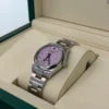 Rolex Oyster Perpetual 31 Pink rosa fucsia NUOVO 2026 full set con documenti e scatola