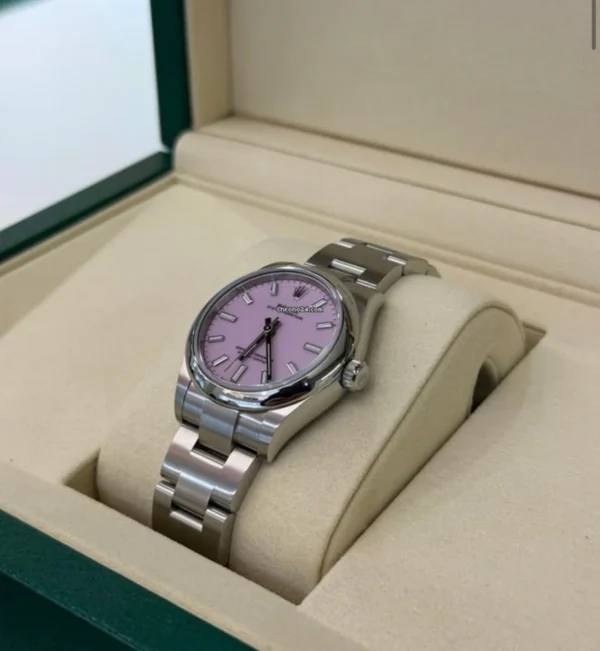Rolex Oyster Perpetual 31 Pink rosa fucsia NUOVO 2026 full set con documenti e scatola