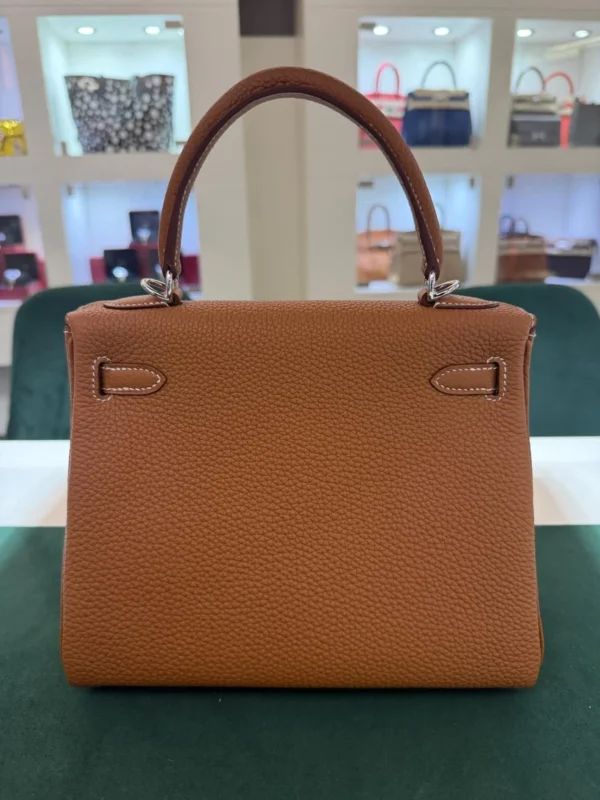 Herm&egrave;s Kelly 25 retourne Nuova 2026 stampa K in pelle togo colore gold hardware in palladio