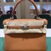 Herm&egrave;s Kelly 25 retourne Nuova 2026 stampa K in pelle togo colore gold hardware in palladio