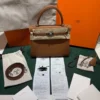 Herm&egrave;s Kelly 25 retourne Nuova 2026 stampa K in pelle togo colore gold hardware in palladio