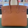 Hermès Birkin 25 retourne veau togo colore GOLD