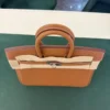 Hermès Birkin 25 retourne veau togo colore GOLD