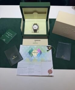 Alternative view of Rolex Daytona oro bianco silver racing dial del 2005 full set top condition documenti full links