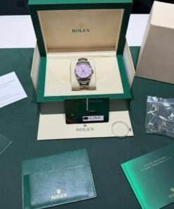 Alternative view of Rolex Oyster Perpetual 36 NUOVO pink rosa dial del 2024 Italia full set con documenti e scatola