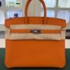 Hermès Birkin 25 retourne veau togo colore orange stampa G NUOVA 2026 Aprile hardware palladio full set con scontrino ufficiale Hermès