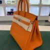 Hermès Birkin 25 retourne veau togo colore orange stampa G NUOVA 2026 Aprile hardware palladio full set con scontrino ufficiale Hermès