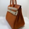 Hermès Birkin 25 retourne veau togo colore orange stampa G NUOVA 2026 Aprile hardware palladio full set con scontrino ufficiale Hermès