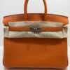 Hermès Birkin 25 retourne veau togo colore orange stampa G NUOVA 2026 Aprile hardware palladio full set con scontrino ufficiale Hermès