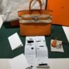 Hermès Birkin 25 retourne veau togo colore orange stampa G NUOVA 2026 Aprile hardware palladio full set con scontrino ufficiale Hermès