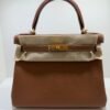 Hermès Kelly 28 retourne NUOVA 2026 seriale G colore gold (marrone) pellame Togo con hardware dorato