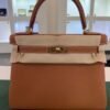 Hermès Kelly 28 retourne NUOVA 2026 seriale G colore gold (marrone) pellame Togo con hardware dorato