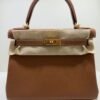 Hermès Kelly 28 retourne NUOVA 2026 seriale G colore gold (marrone) pellame Togo con hardware dorato