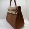 Hermès Kelly 28 retourne NUOVA 2026 seriale G colore gold (marrone) pellame Togo con hardware dorato