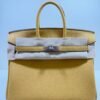 WhatsApp Image 2026-05-20 at 20.37.00 (4) Hermès Birkin 25 retourne veau togo colore Paille ( giallo ) stampa G NUOVA 2026 hardware palladio full set con scontrino ufficiale Hermès pellicole stickers ovunque