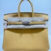 WhatsApp Image 2026-05-20 at 20.37.01 Hermès Birkin 25 retourne veau togo colore Paille ( giallo ) stampa G NUOVA 2026 hardware palladio full set con scontrino ufficiale Hermès pellicole stickers ovunque