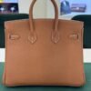 WhatsApp Image 2026-06-10 at 10.42.01 (2) Hermès Birkin 25 retourne veau togo colore GOLD