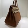 WhatsApp Image 2026-06-10 at 10.42.02 Hermès Birkin 25 retourne veau togo colore GOLD