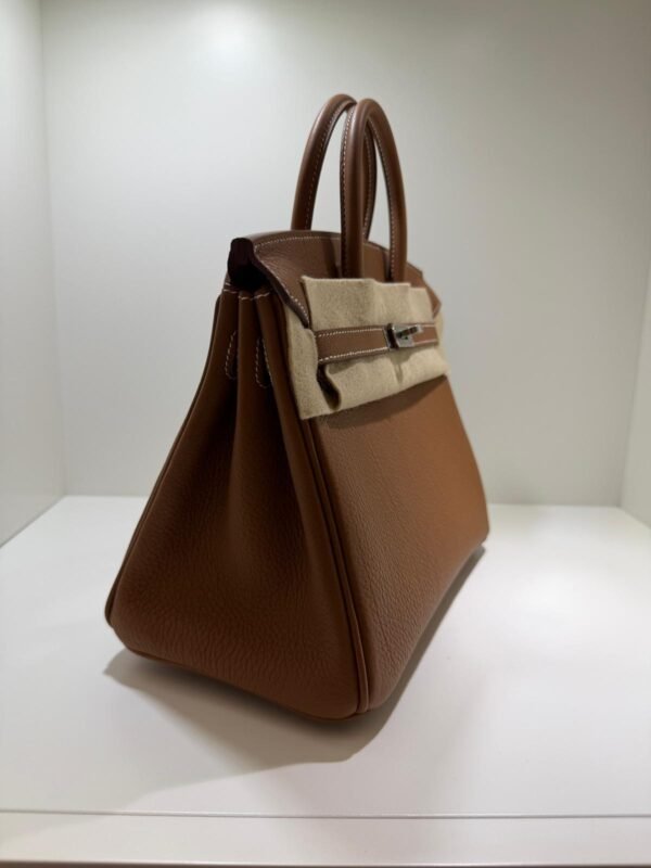 WhatsApp Image 2026-06-10 at 10.42.02 Hermès Birkin 25 retourne veau togo colore GOLD