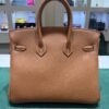 WhatsApp Image 2026-06-10 at 10.42.03 (2) Hermès Birkin 25 retourne veau togo colore GOLD