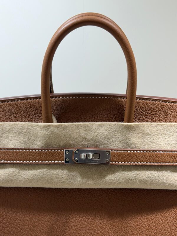 WhatsApp Image 2026-06-10 at 10.42.03 Hermès Birkin 25 retourne veau togo colore GOLD