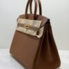 WhatsApp Image 2026-06-17 at 12.22.54 Hermès Birkin 25 retourne veau togo colore GOLD ( cuoio caramello ) stampa G NUOVA 2026