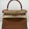 Herm&egrave;s Kelly 28 retourne NUOVA 2026 seriale G color gold (marrone) pellame Togo con hardware dorato