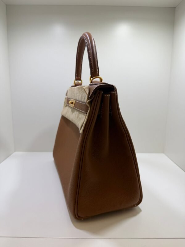 Herm&egrave;s Kelly 28 retourne NUOVA 2026 seriale G color gold (marrone) pellame Togo con hardware dorato