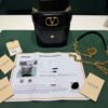WhatsApp Image 2026-07-01 at 17.17.48 (1) Valentino Garavani Mini Crossbody Bag VLogo Moon secchiello excellent condition con tracolla hardware dorato.