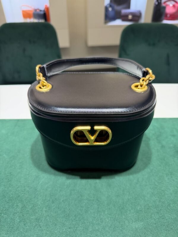WhatsApp Image 2026-07-01 at 17.17.48 Valentino Garavani Mini Crossbody Bag VLogo Moon secchiello excellent condition con tracolla hardware dorato.