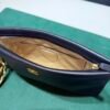 Chanel O-Shape Clutch Nera in Pelle con Hardware Dorato del 2025