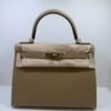 Hermès Kelly 28 sellier veau pellame epsom NUOVA 2026 seriale G color poussier hardware Permabrass full set
