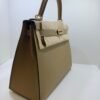 Hermès Kelly 28 sellier veau pellame epsom NUOVA 2026 seriale G color poussier hardware Permabrass full set con scatola Dustbug e scontrini fiscali.